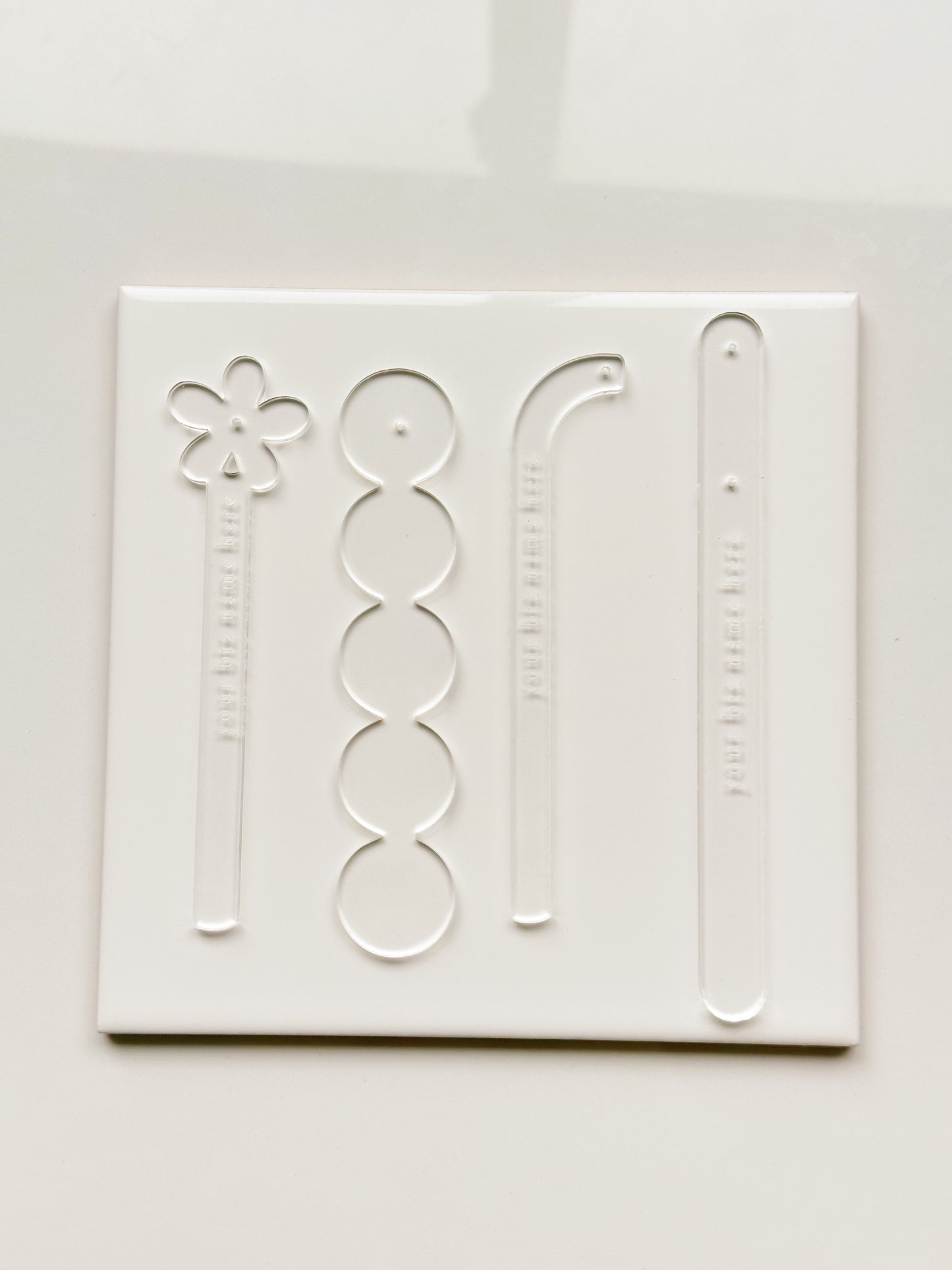 Palillos de acrílico transparente para probar aretes