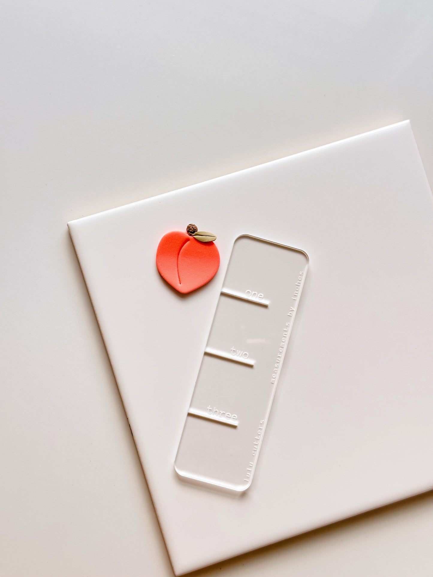 Coupe-argile pêche + feuille