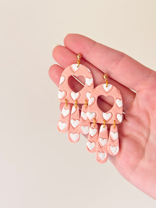 Boucles d'oreilles coeurs blancs