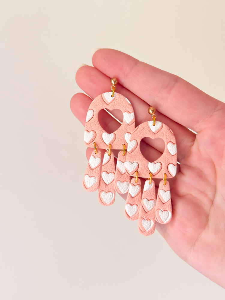 Boucles d'oreilles coeurs blancs